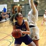 North Kitsaps Grace Johnson looks for a way to the basket against Kingston. North Kitsap defeated its inter-district rival 67-60 on Jan. 19. (Mark Krulish/Kitsap News Group)