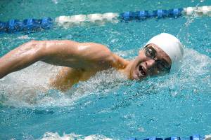 <em>Olympics Haakon Meyer swims a state-qualifying time during the 500-yard freestyle, giving him Ironman status. </em>Mark Krulish/Kitsap News Group