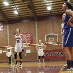 Jennie Goldsberry of Graham-Kapowsin, right, watches Kaylee McEdward of South Kitsap shoot from the free throw line. (Jacob Moore/Kitsap News Group)