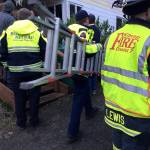 Bob Smith | Independent                                South Kitsap Fire and Rescue crews bring in ladders to rescue a man who fell into an interior well in the laundry room of a South Kitsap home Jan. 30.