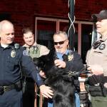 <em>Kitsap County Sheriffs Deputy Aaron Baker, with the K-9 unit, thanks the Gavin Buchanan Memorial Foundation for their fundraising efforts.</em> (Michelle Beahm | Kitsap Daily News)