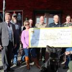 <em>The Gavin Buchanan Memorial Foundation raised $6,240 for the KCSO and BPD K-9 units.</em> (Michelle Beahm | Kitsap Daily News)
