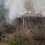 Bremerton city firefighters were working at 5 p.m. Feb. 3 to contain a house fire on Tracyton Beach Road. (Jacob Moore/Kitsap News Group)