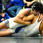 Olympics Alec Acfalle won a major decision against Caleb Bullard, of Blaine, in the 138 finals at the 2A Region 2 tournament on Feb. 10. (Mark Krulish/Kitsap News Group)