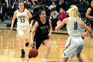 <em>North Kitsaps Noelani Barreith looks for space in the Port Angeles defense in her teams district tournament semifinal game. The Vikings lost 37-36 and will play for third place on Feb. 17 against Fife. </em>Mark Krulish/Kitsap News Group