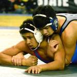 Olympics Kyle Ignacio took third at the 2A state wrestling tournament at 160 pounds. Here, Ignacio defeats Braxton Seich of Washington, 12-3, in the second round of the tournament. (Mark Krulish/Kitsap News Group)
