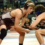South Kitsaps Xavier Eaglin, a freshman, won his first state championship at Mat Classic XXX in the 106 pound division. He was part of an effort that helped the Wolves net the overall 4A team title. (Mark Krulish/Kitsap News Group)