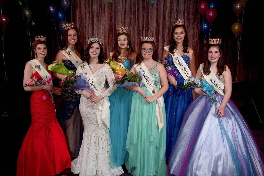 Shirley DeFord of Shirley DeFord Photography                                The 2018 Fathoms O Fun Royalty Court poses for its first official portrait: Left to right, Senior Princess Paige Hoffsommer, Senior Princess Maria Hoyt, Queen Tamara Medal, Princess Ellie Travis, Duchess Veronica Mihai, Princess Danyelle Wilcox and Junior Princess Kate Thompson.