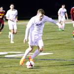 <em>George Beddoe dribbles up the field for North Kitsap during an early-season game against Kingston. </em>Mark Krulish / Kitsap News Group<em></em>