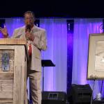 Robert Perkins talks about his father, Roscoe C. Perkins, Jr., at a ceremony in which the Perkins family are presented with the Congressional Gold Medal on Roscoe Perkins behalf.                                Michelle Beahm | Kitsap News Group