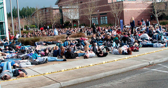 Bainbridge High School students participate in a die-in. Photo by Luciano Marano