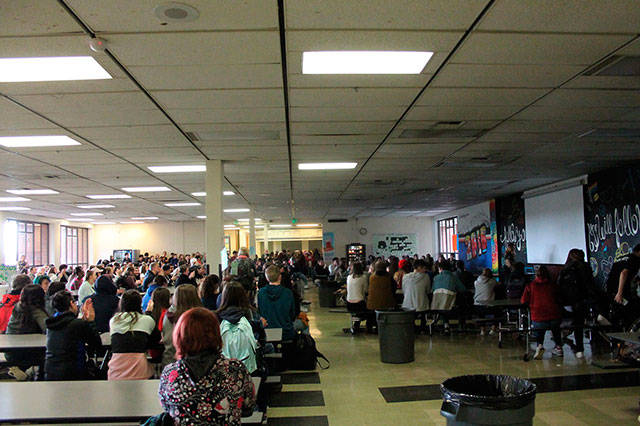 Students at Central Kitsap High School sat in the cafeteria to protest gun violence following a Florida school shooting. Photo by Jacob Moore