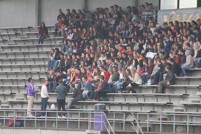 Students at North Kitsap High School gather at the stadium to rally in protest of gun violence in the wake of a deadly shooting at a Floriday school. Photo by Nick Twietmeyer