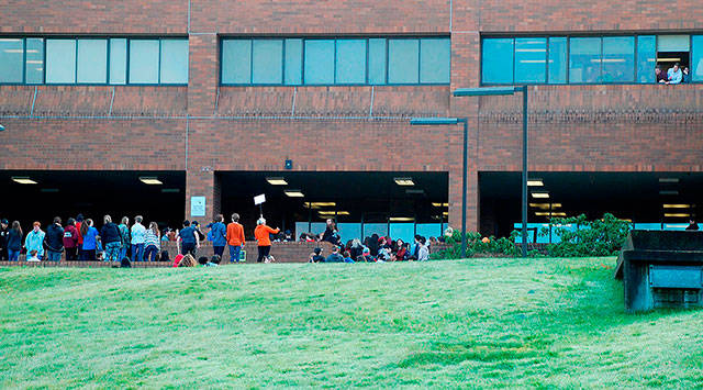Students at South Kitsap High School hold a walkout in protest of gun violence. Photo by Bob Smith