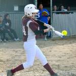 South Kitsap second baseman Teanna Lathum strikes one of her two singles in her teams 5-3 win over Olympic. (Mark Krulish/Kitsap News Group)
