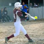 South Kitsap second baseman Teanna Lathum strikes one of her two singles in her teams 5-3 win over Olympic. (Mark Krulish/Kitsap News Group)
