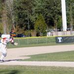The Cougars Fred Buckson races home in the first inning of the game against Peninsula on March 20. He scored the first run of the game. Jacob Moore | Kitsap News Group
