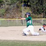 Cougars sophomore third baseman Kade Coombe dove, but missed the tag on Peninsula sophomore outfielder Peter King. Jacob Moore | Kitsap News Group