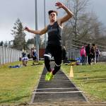 North Kitsaps Blake Wetzsteon leaps into the air during his triple jump. He wound up taking second place in the event. Jacob Moore | Kitsap News Group