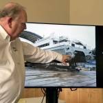 <em>Kitsap Transit Executive Director John Clauson, shows photos of the work being done to refurbish the M/V Finest before its arrival in Kingston this summer.</em>                                Nick Twietmeyer / Kitsap News Group