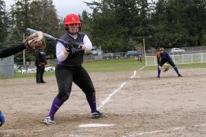 <em>Vikings junior Makenzie Wagner eyes a pitch up and out of the strike zone for a ball. She scored two runs on the day. </em>Jacob Moore / Kitsap Daily News