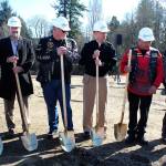 Members of the Combat Veterans Motocycle Association prepare to turn over shovelfuls of dirt to signify the groundbreaking of the new VA outpatient clinic in Silverdale.                                Michelle Beahm / Kitsap News Group