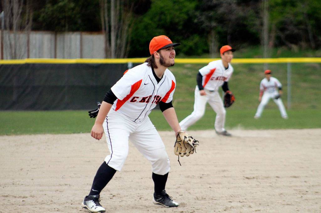 Cougars senior infielder Teagan Taafe prepares for a pitch in the sixth inning of his game against Capital High School. Jacob Moore | Kitsap Daily News