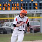 Junior Kaden McDowell, who entered the game as a pinch runner, races for home plate. He scored the winning run for Central Kitsap to complete his teams comeback bid. Jacob Moore | Kitsap Daily News