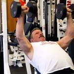 <em>Bob Covello using 40-pound weights to work out at Poulsbo Athletic Club on April 9. </em>Jacob Moore / Kitsap Daily News