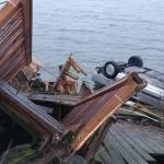 A car carrying three juveniles, driven by an unlicensed 15-year-old crashed into Liberty Bay after losing control on Lemolo Shore Drive. Photo courtesy Kathleen Byrne-Barrantes