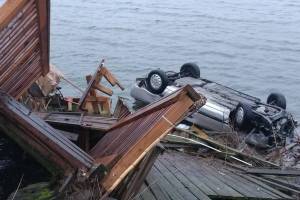 UPDATE: VIDEO | Car lands upside down in Liberty Bay after 15-year-old, unlicensed driver loses control