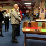 South Kitsap High Schools principal, Diane Fox, points out the capabilities of the facilitys library to visitors touring the school on April 16. (Bob Smith | Kitsap Daily News photo)