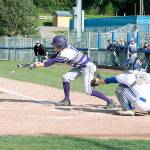 North Kitsap second baseman Max Larsen lays down a bunt during his teams 13-1 victory on April 18. (Mark Krulish/Kitsap News Group)