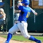 Andy McMartin drives a single into the outfield against Klahowya. (Mark Krulish/Kitsap News Group)
