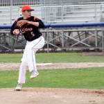 Freshman Nate DeSchryver carries his momentum toward homeplate during a second inning pitch. Jacob Moore | Kitsap Daily News