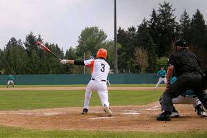 Cougars senior Rylee Orteza fouls off a pitch in the fifth inning of his teams first game against Spanaway Lake on May 5. Jacob Moore | Kitsap Daily News