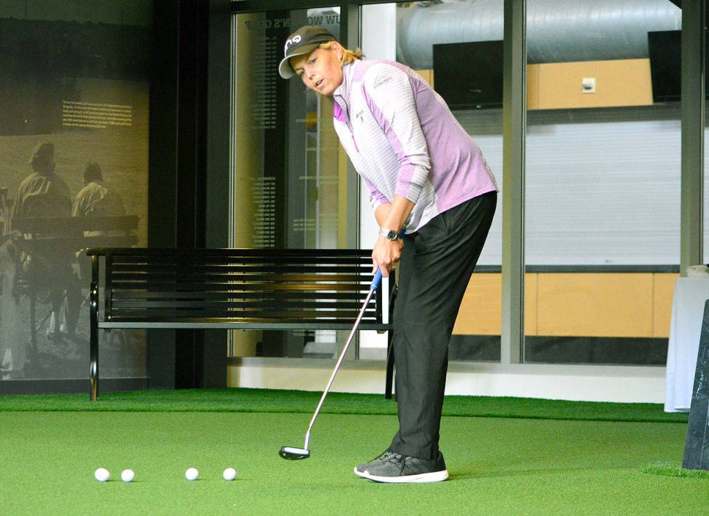 Wendy Ward, the newest member of the Legends Tour and current Washington resident, gives a putting clinic at the University of Washington following the press conference to announce the Legends Cup. (Mark Krulish/Kitsap News Group)