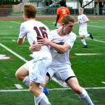 Mark Krulish | Kitsap News Group                                Quinn Dick (2) celebrates with George Robertson (16) after his goal put South Kitsap ahead 2-1. The Wolves advanced to the second round of the district tournament.