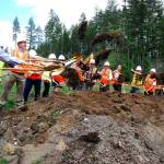 Bob Smith | Independent                                Armed with gold-colored shovels, elected officials from Port Orchard and the state Legislature toss dirt into the air during the groundbreaking ceremony May 11.