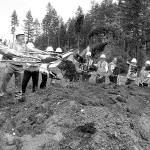 Bob Smith | Independent                                Armed with gold-colored shovels, elected officials from Port Orchard and the state Legislature toss dirt into the air during the groundbreaking ceremony May 11.