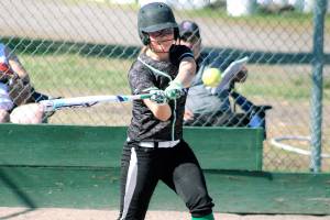 Klahowya senior Karli Eberhard takes a swing during Tuesdays game against Seattle Christian. (Mark Krulish/Kitsap News Group)