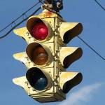 The Tremont Street-South Kitsap Boulevard intersection will switch to a four-way flashing red signal on Monday, May 21. (photo illustration)