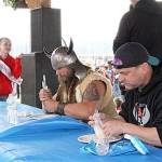 The lutefisk eating competition was a central feature of Sundays festivities. Little Miss Viking Fest Everlee Brenton cheers on as Brennan Webster and Tim Leary compete in the final round of the competition. Nick Twietmeyer / Kitsap News Group