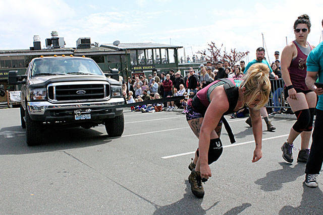 Erin Murray pulls a truck during Sundays not-so-appropriately named Strong Man Competition. Nick Twietmeyer / Kitsap News Group