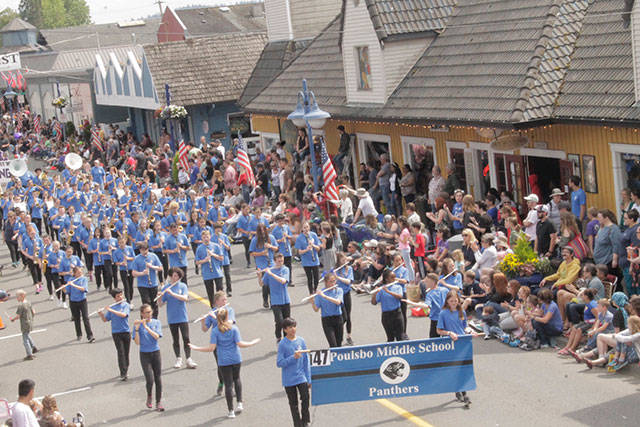 Poulsbo Middle school entertains the parade watchers as they march down front street during Viking Fests 5oth annual celebration. Donna Etchey | Kitsap News Group