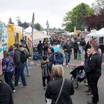 Vendors and nonprofits set up stalls along Anderson Parkway to sell their goods and generate awareness for their causes. Nick Twietmeyer / Kitsap News Group