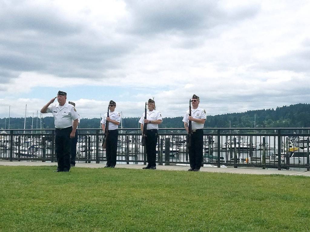 A salute to the flag. (Mark Krulish/Kitsap News Group)