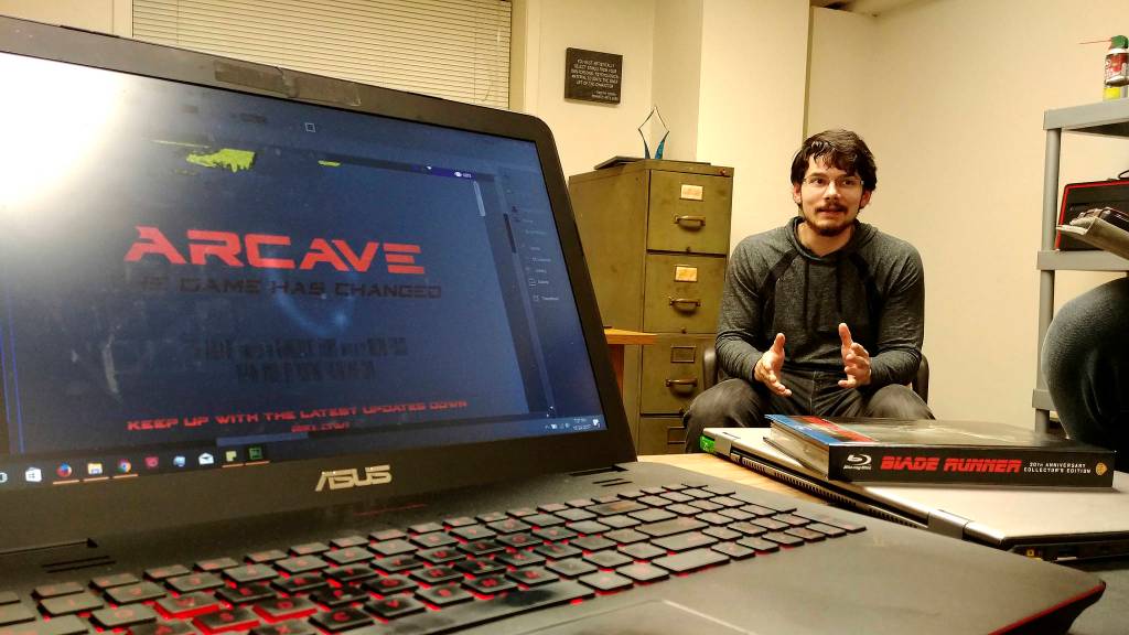 Micah Fusco discusses The Arcave at a meeting with his company, Monoculus Films                                Photo courtesy Arcave Production Staff