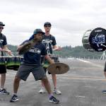 The Seattle Seahawks drumline, Blue Thunder, performs aboard the aircraft carrier USS John C. Stennis (CVN 74). The Seattle Seahawks football team and Sea Gals cheerleaders held a military appreciation event aboard to meet and talk with sailors.                                Mass Communications Specialist Seaman Angelina Grimsley / U.S. Navy
