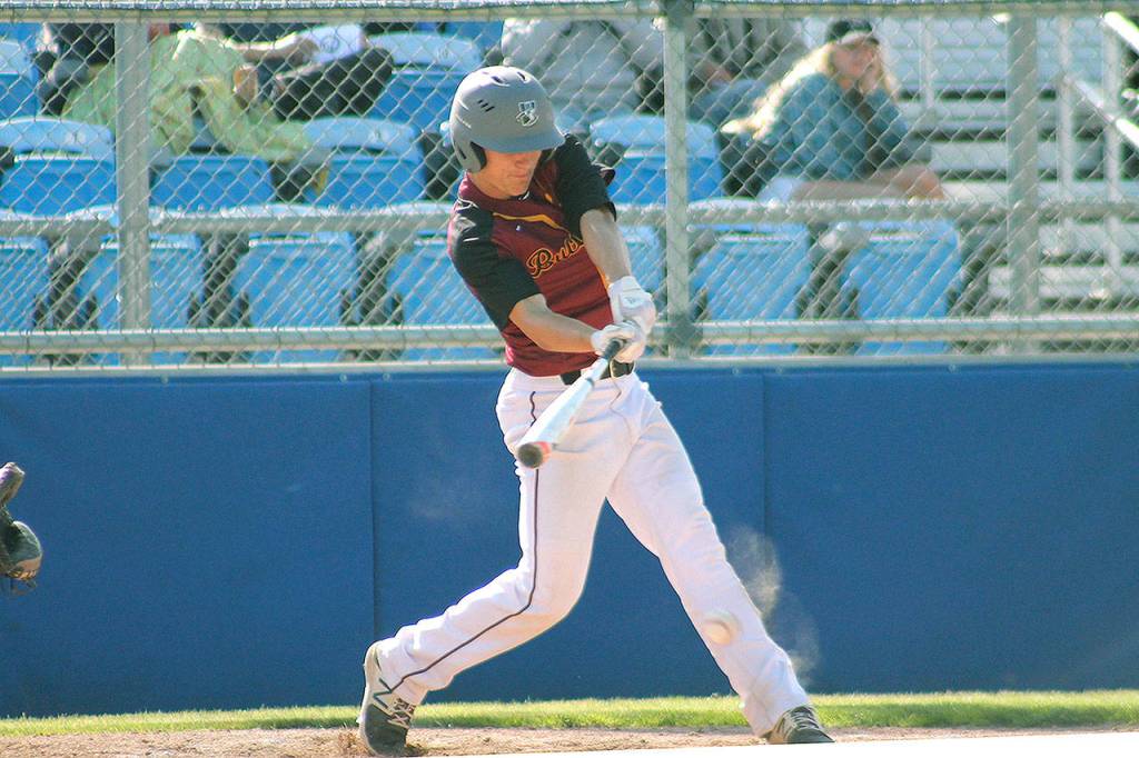 Kingstons Ethan Sax hits a hard grounder during the 51st Kitsap Senior All-Star Baseball Game. (Mark Krulish/Kitsap News Group)